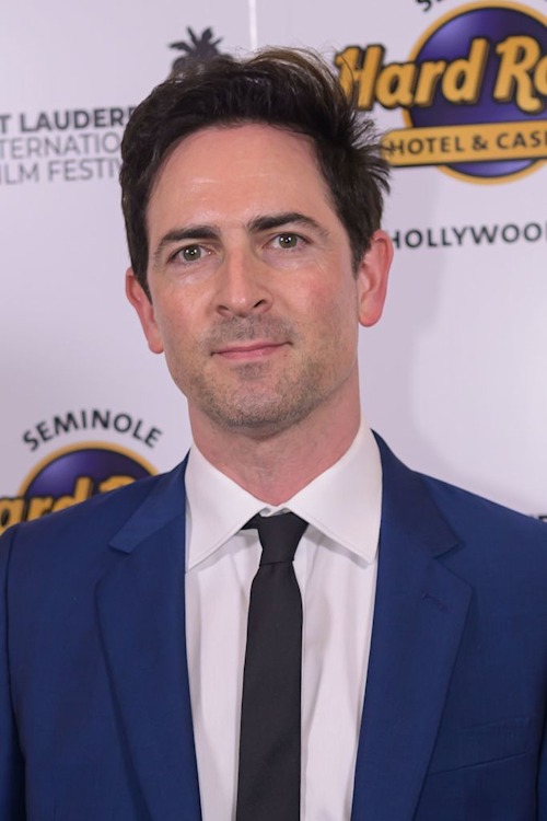 Brett Ryland in a blue suit