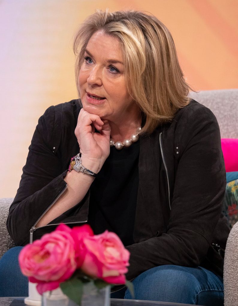 Fern Britton in pearl necklace and black outfit