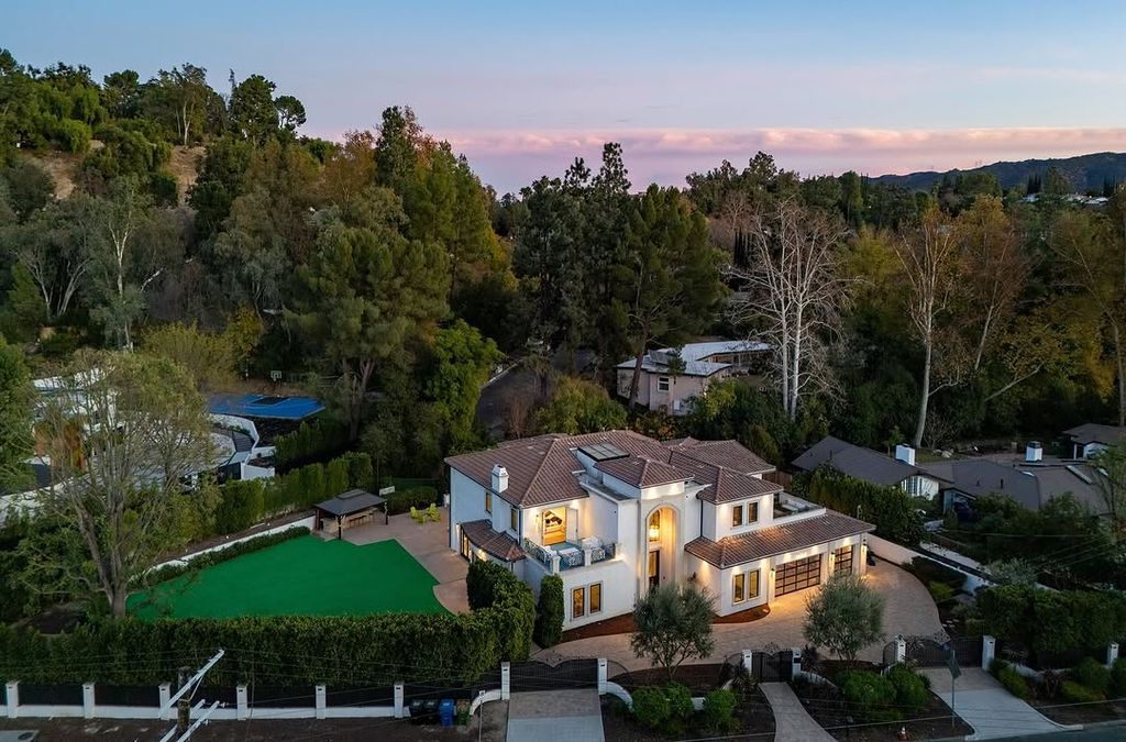 big house amidst trees