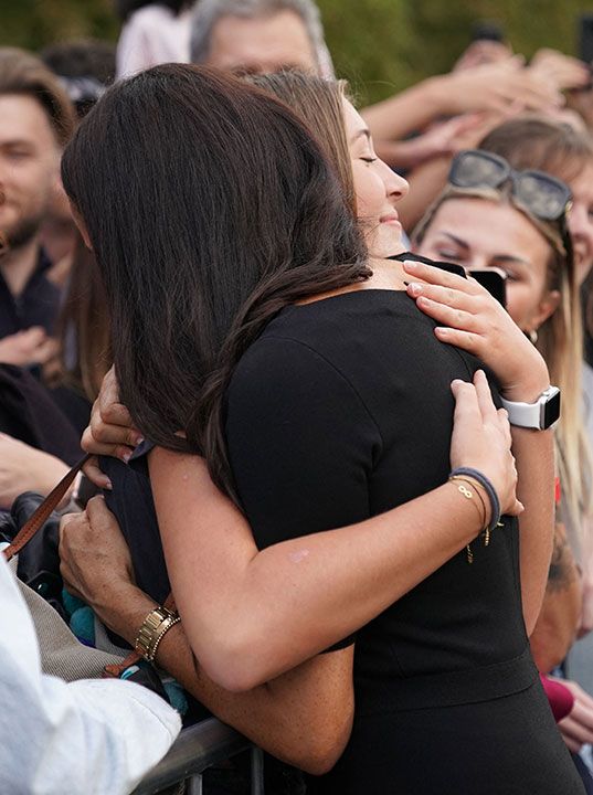 Duchess of Sussex comforts fan in Windsor