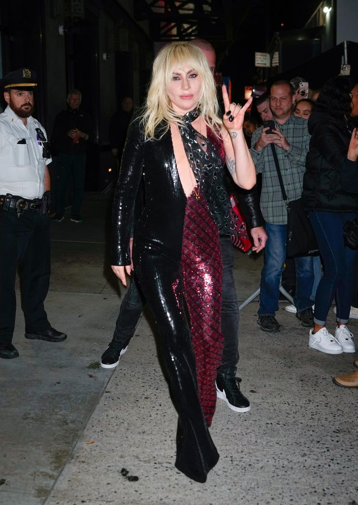 Lady Gaga rocks her bangs in plunging jumpsuit