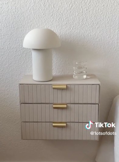 bedside cabinet mounted on the wall