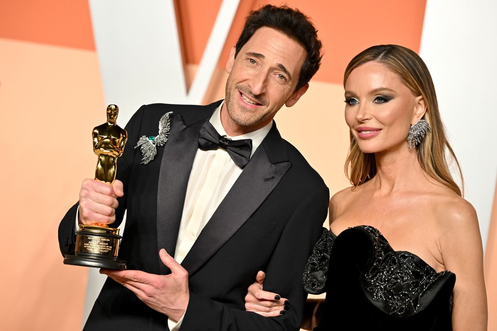 Adrien Brody and Georgina Chapman attend the 2025 Vanity Fair Oscar Party Hosted By Radhika Jones at Wallis Annenberg Center for the Performing Arts on March 02, 2025 in Beverly Hills, California