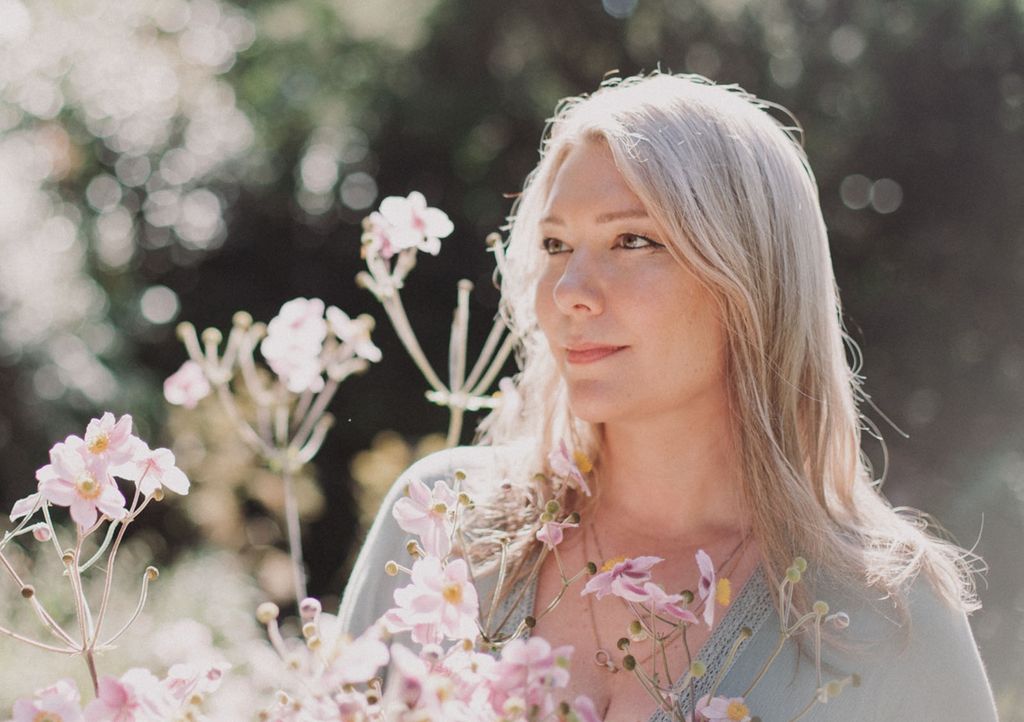 Rebecca Campbell with some flowers