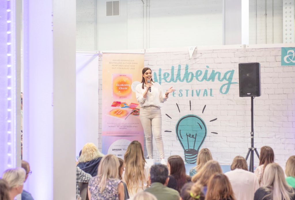 Emma delivering a speech at the Wellbeing Festival