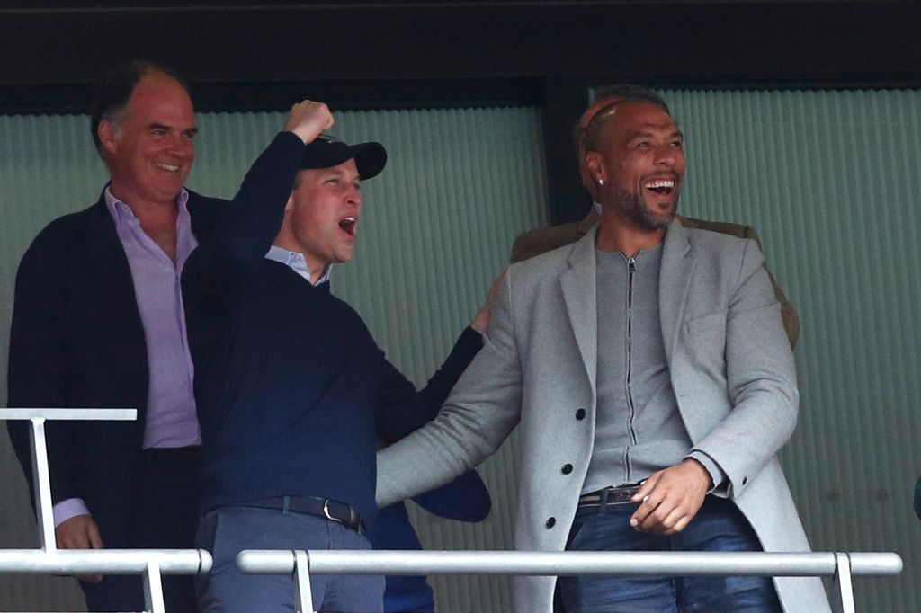 Prince William and John Carew celebrate Villa's goal