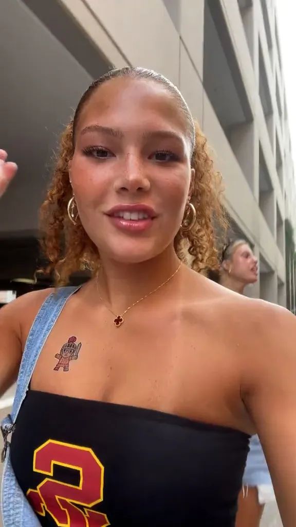 Isabella Strahan showcases her chest tattoo