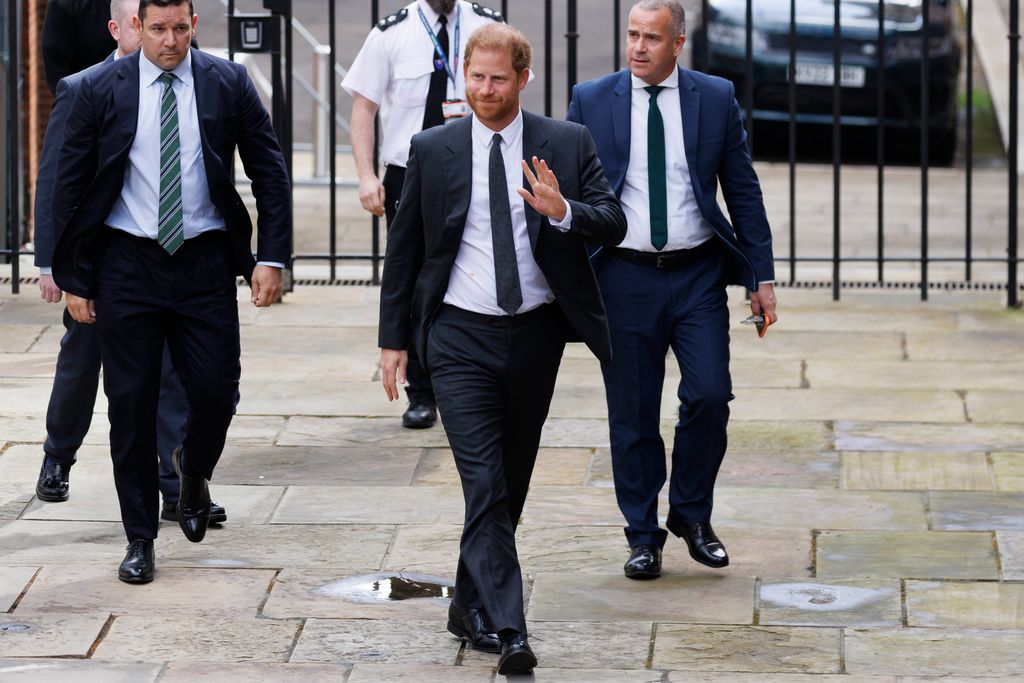 Prince Harry waving in suit 