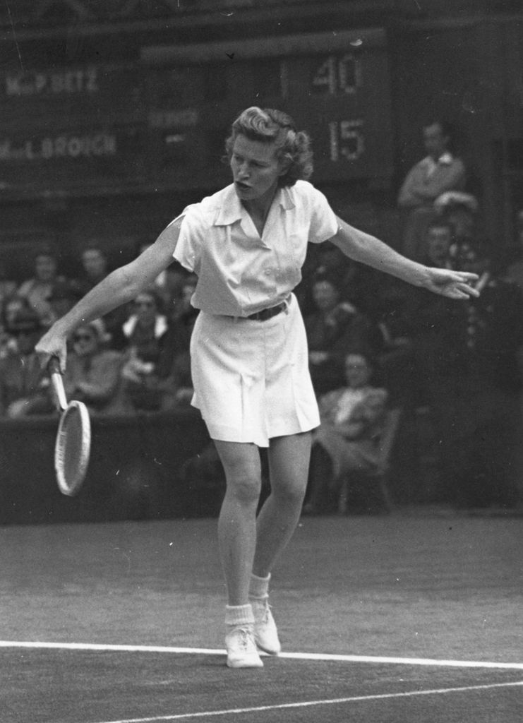 American tennis player Pauline Betz in action against Louise Brough in the final of the women's singles at the lawn tennis championships, Wimbledon 1946.  Original Publication: People Disc - HD0430   (Photo by Topical Press Agency/Getty Images)