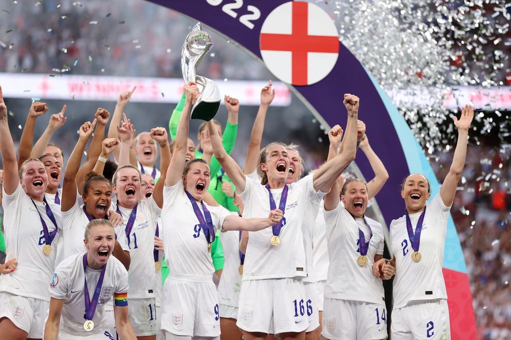 Ellen White and Jill Scott of England lift the trophy during the UEFA Women's Euro 2022 final match between England and Germany in 2022