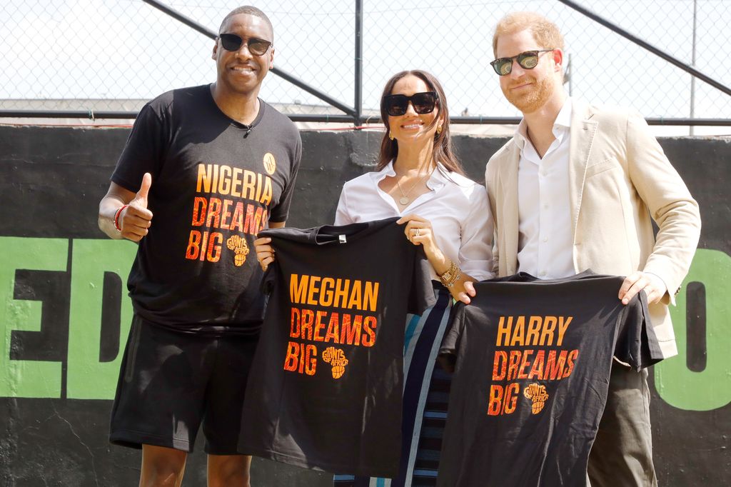 Harry and Meghan gifted T-shirts from Giants of Africa