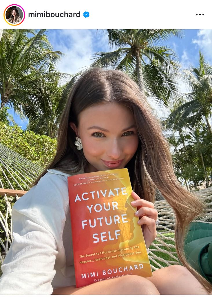 Mimi relaxes with her book 
