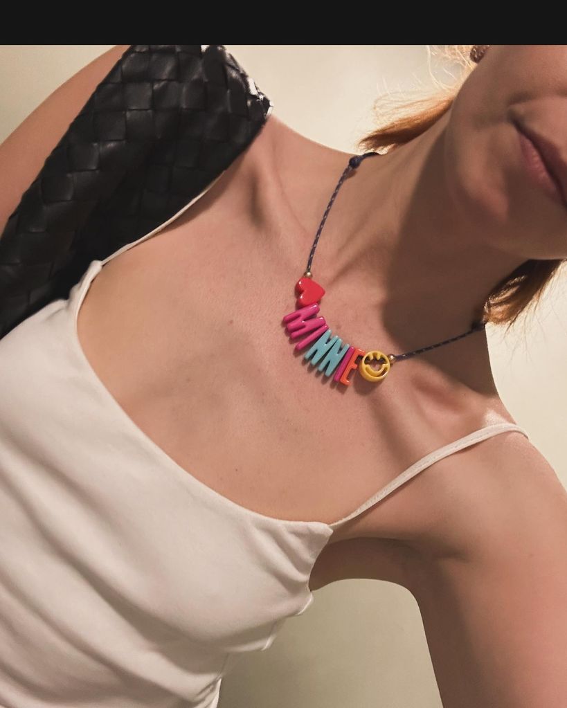 Stacey dooley with 'Minnie' necklace