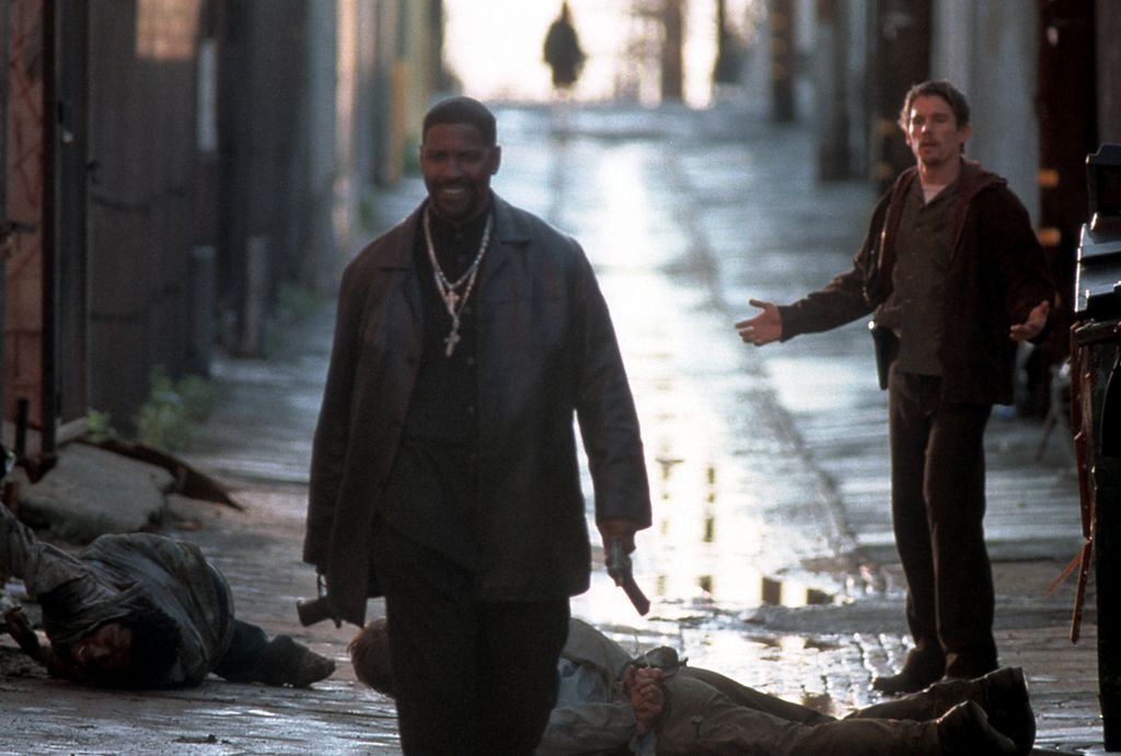 Denzel Washington walks away from Ethan Hawke in a scene from the film 'Training Day', 2001