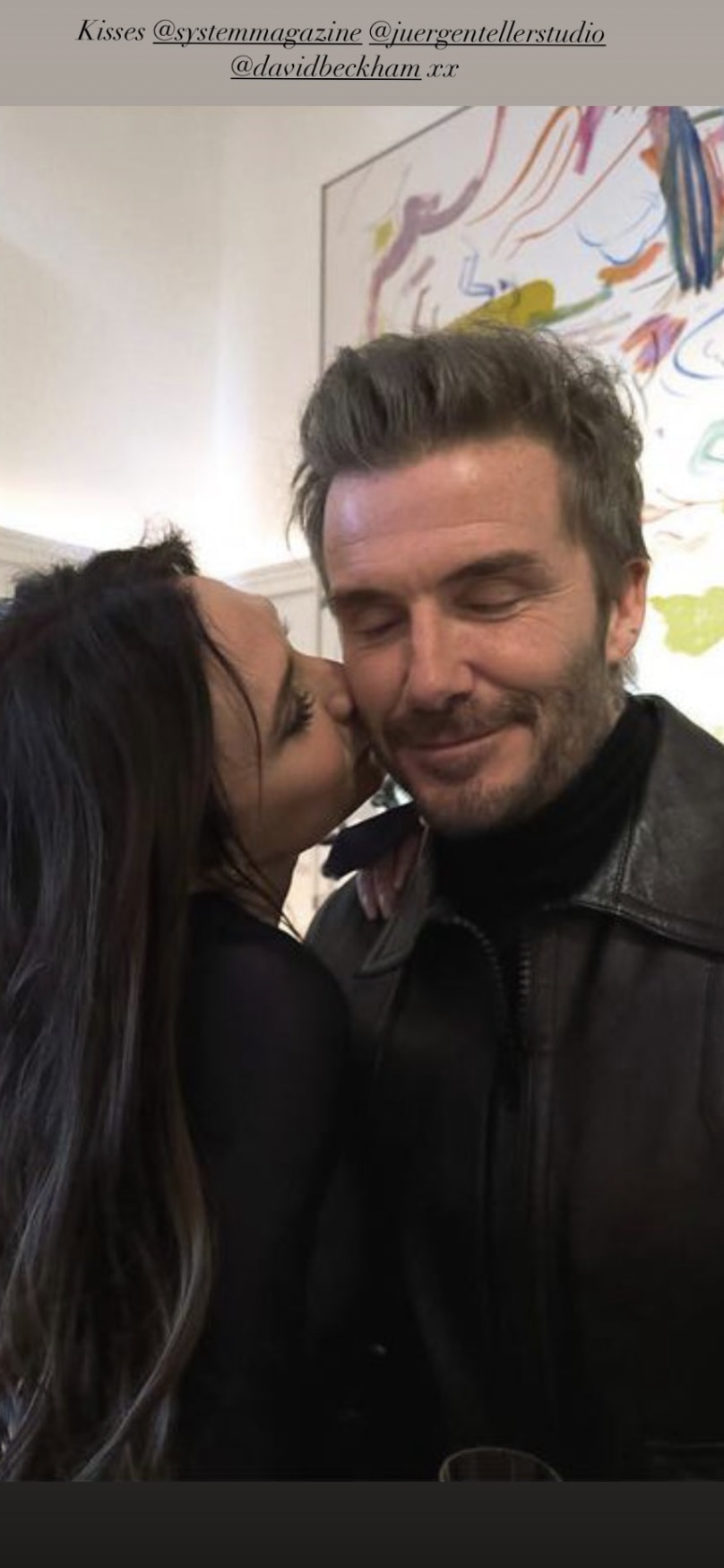 Victoria Beckham kissing David Beckham