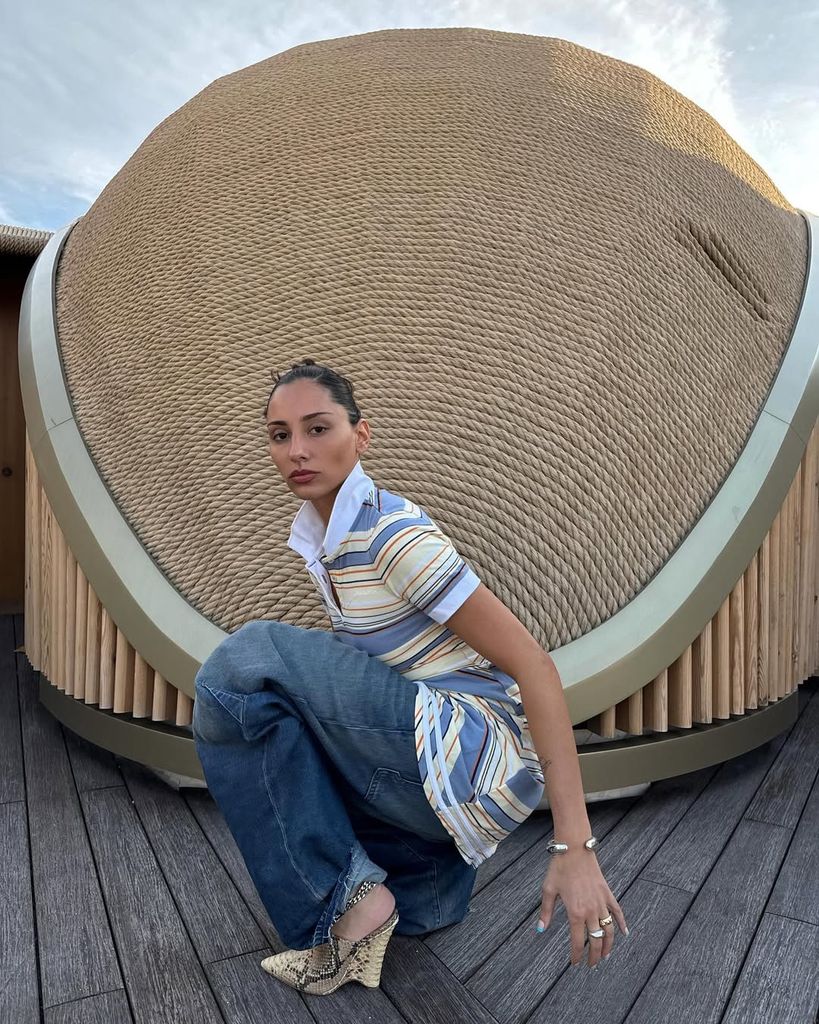 Olivia Pezzente in stripe shirt