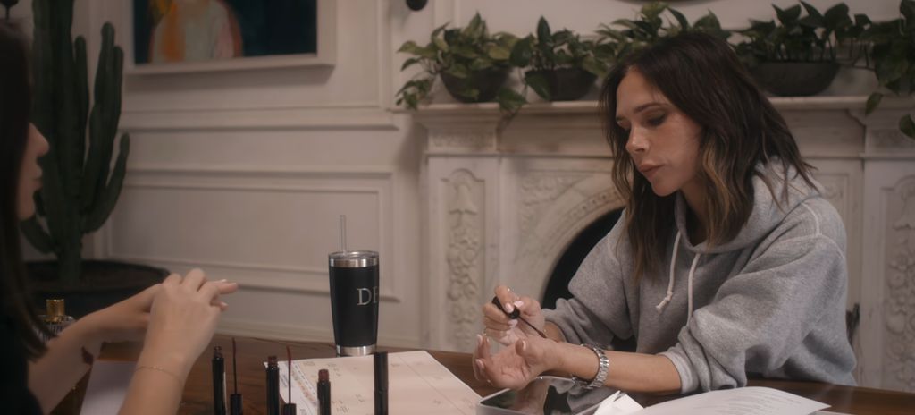 Victoria Beckham grey hoodie in netflix show