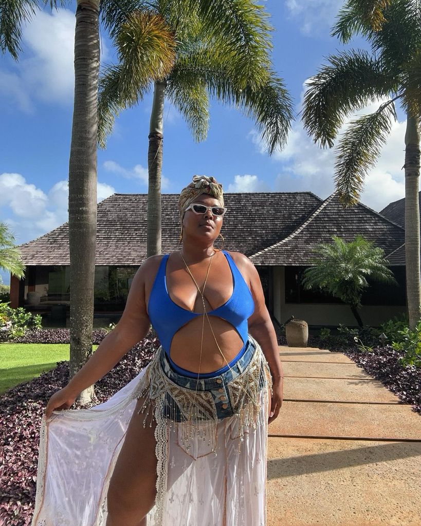 lizzo in blue swimsuit