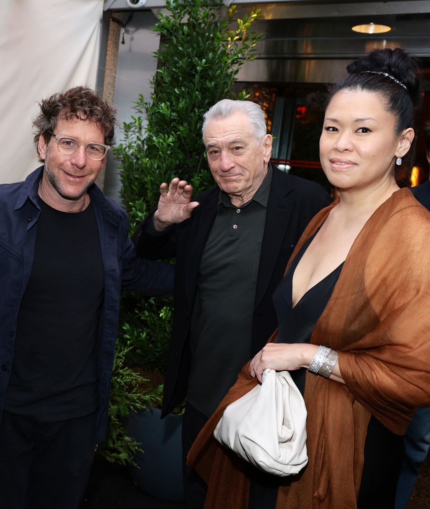 NEW YORK, NEW YORK - JUNE 10: (L-R) Dustin Yellin, Robert De Niro and Tiffany Chen attend the CHANEL Tribeca Festival Artists Dinner at The Odeon on June 10, 2024 in New York City.  (Photo by Dimitrios Kambouris/WireImage)