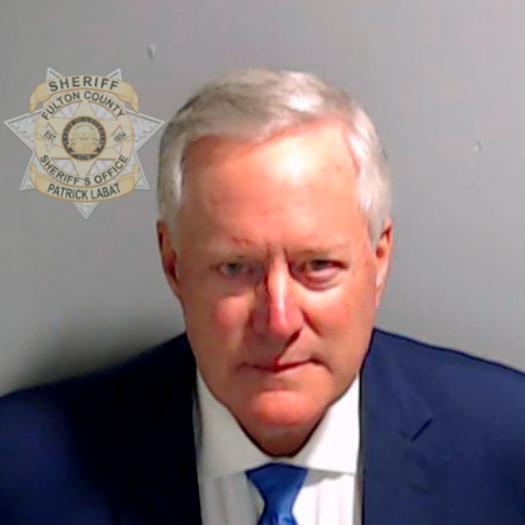 In this handout provided by the Fulton County Sheriff's Office, former White House Chief of Staff Mark Meadows poses for his booking photo on August 24, 2023 in Atlanta, Georgia. Former President Donald Trump and 18 others facing felony charges in the indictment related to tampering with the 2020 election in Georgia have been ordered to turn themselves in by August 25