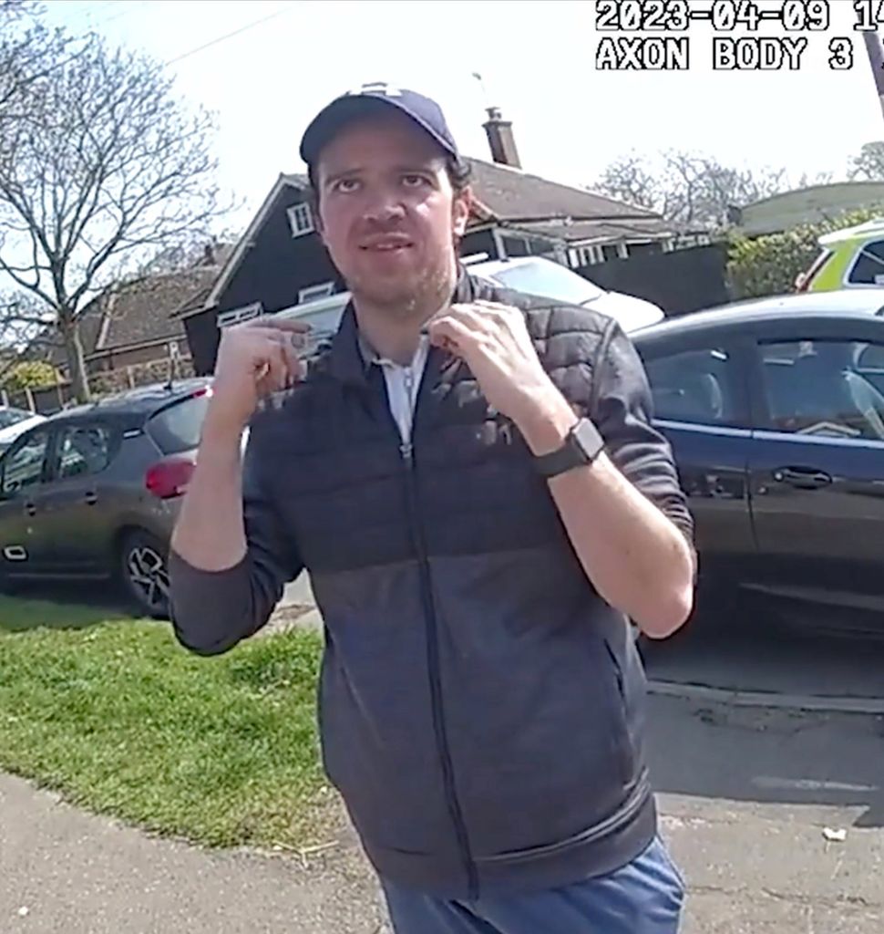Police bodycam footage showing Luke D'Wit, 34, who was jailed for life today and told he must serve a minimum of 37 years for murdering Stephen Baxter, 61, and his wife Carol, 64, who were found dead at their home in West Mersea, Essex.