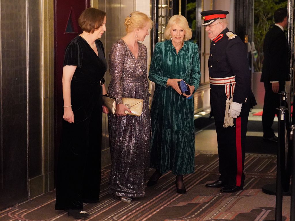 Queen Camilla arrives at event in green dress