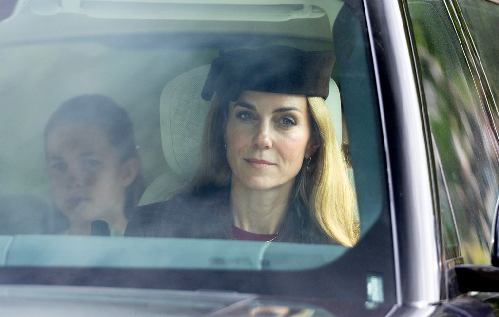 princess kate wearing hat in a car