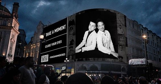 Junior and Peter on a billboard