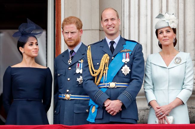 Princes William and Harry, with Kate Middleton and Meghan Markle on the Buckingham Palace balcony