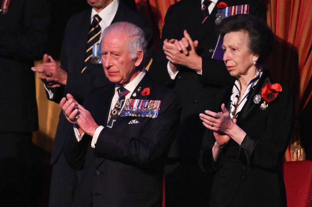 King Charles and Princess Anne clapping