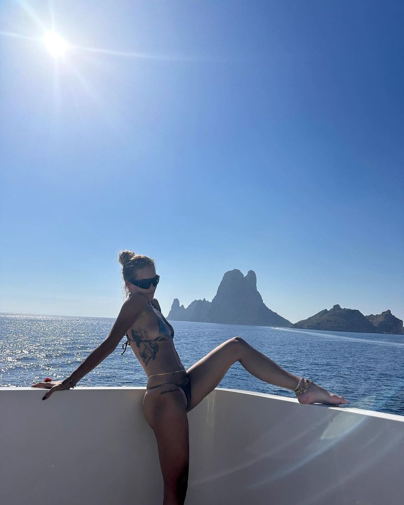 Rita Ora lounging on a yacht