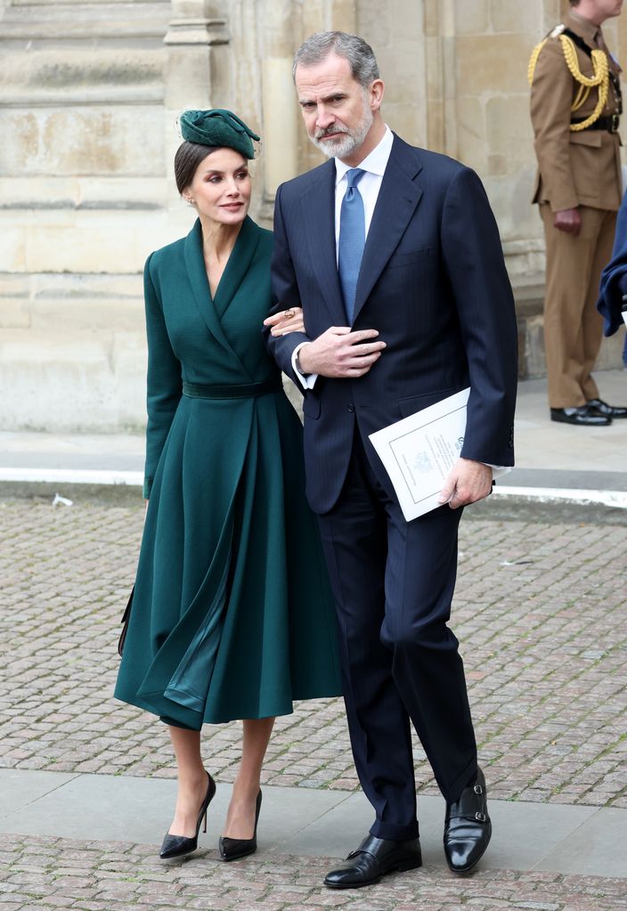 Queen Letizia in green dress and King Felipe leaving Westminster Abbey