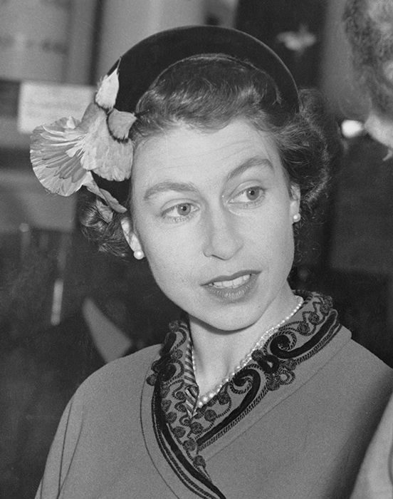 the queen wearing a headband