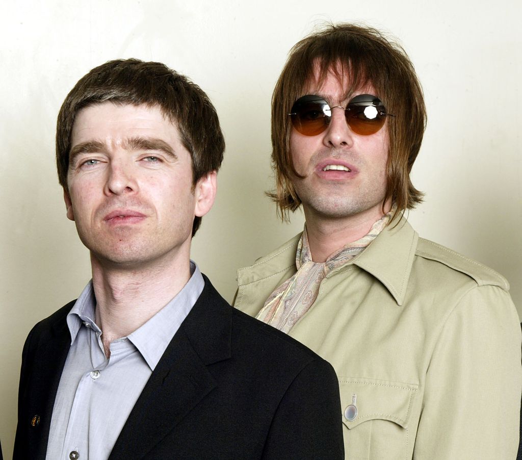 Noel and Liam Gallagher of rock band Oasis in 2003