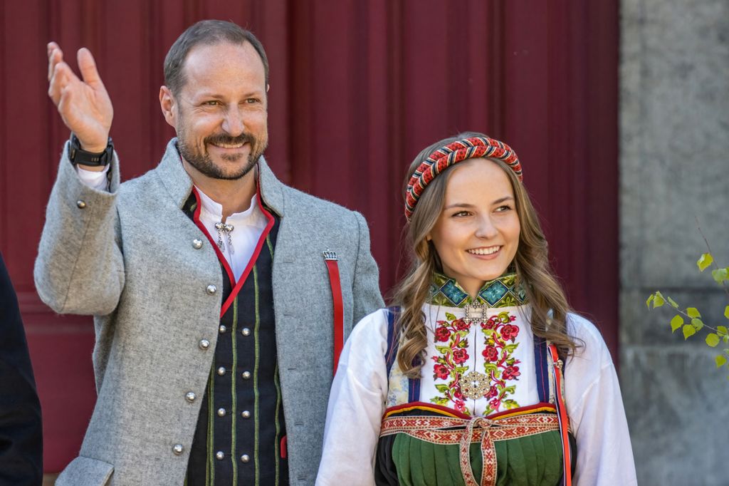 Crown Prince Haakon of Norway smiling and waving