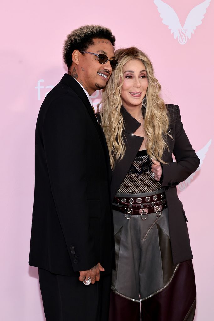 (L-R) Alexander "AE" Edwards and Cher attend the Victoria's Secret Fashion Show 2024 