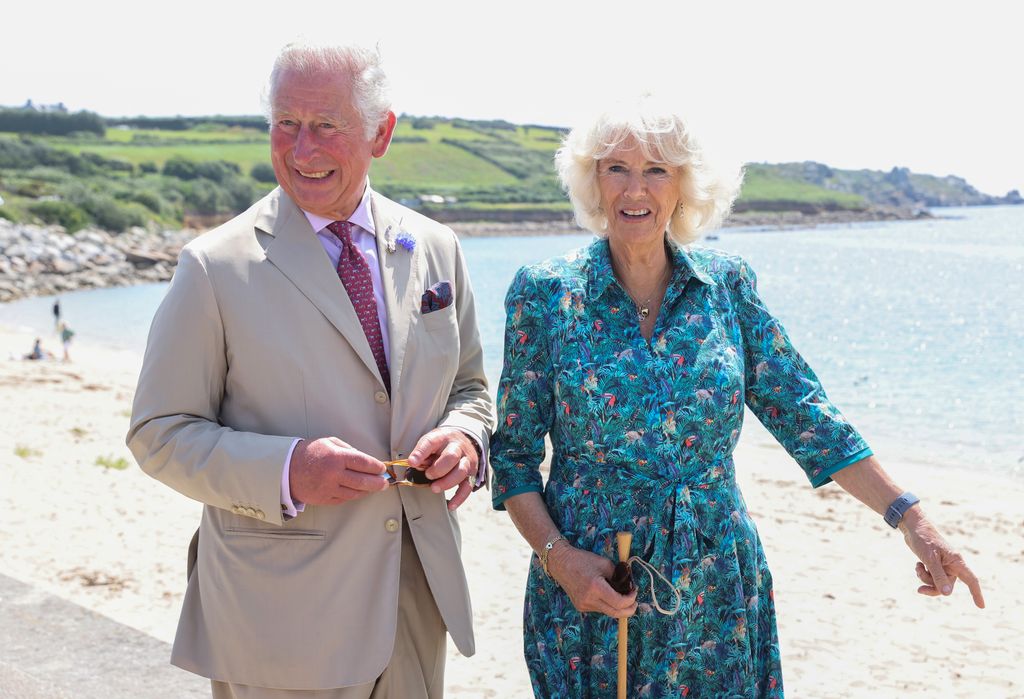 charles and camilla laughing on isles of scilly 