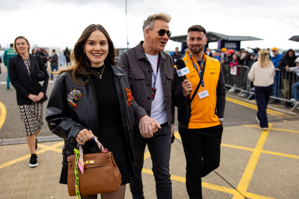 father and daughter holding hands at silverstone