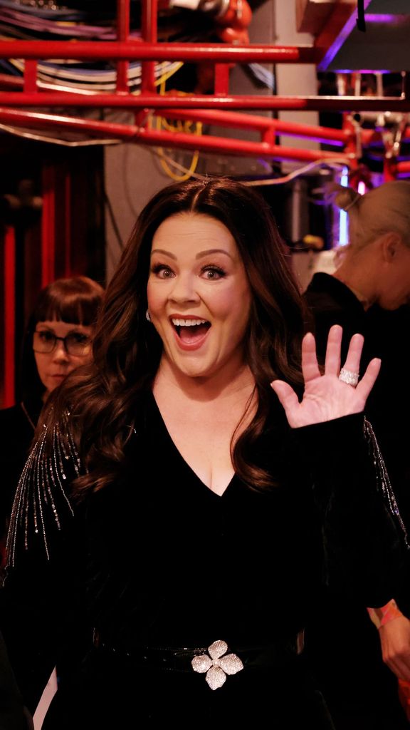 Melissa looked stunning in a black pantsuit