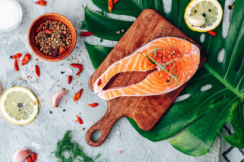Salmon. Raw trout red fish steak with ingredients for cooking 