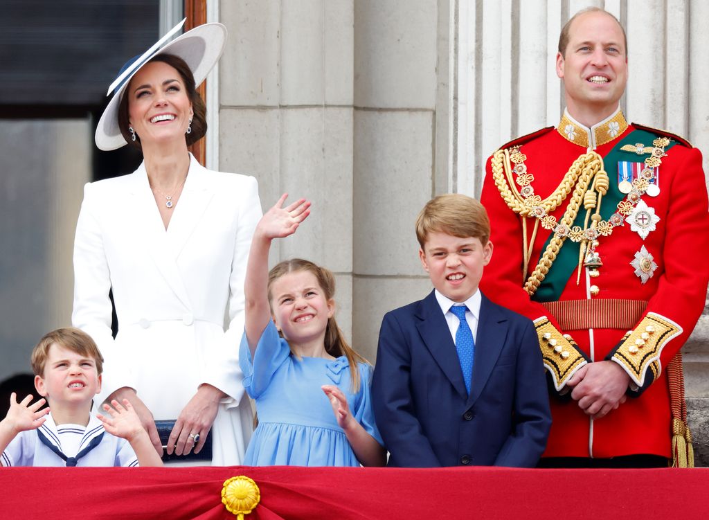 Prince Louis, Princess Kate, Princess Charlotte, Prince George and Prince William stand at watch flyover 