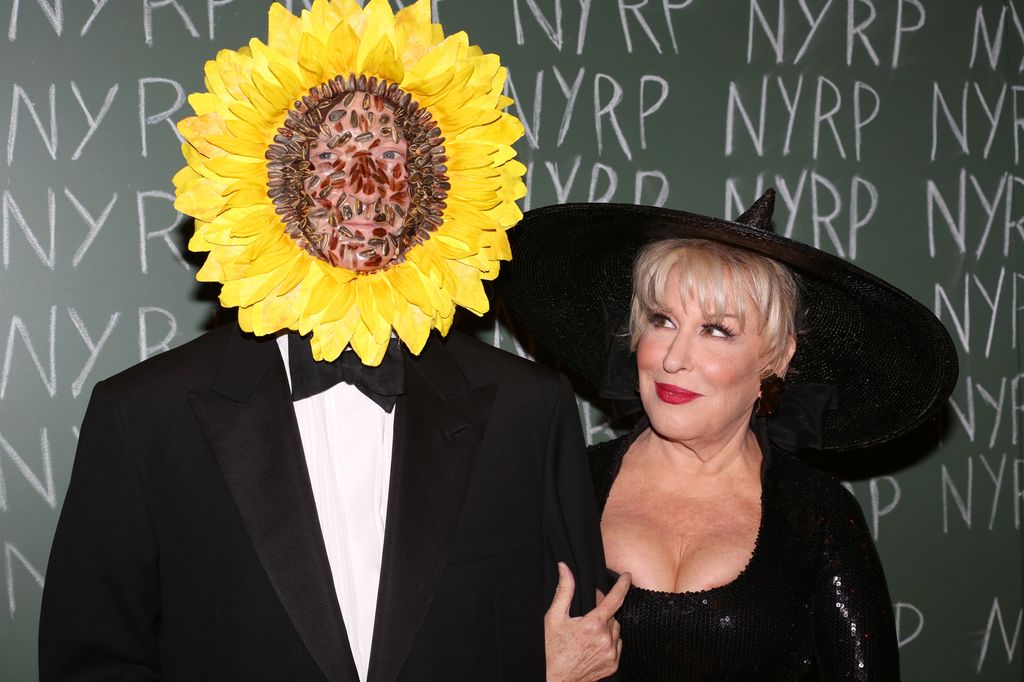 Martin von Haselberg and Bette Midler attends the 19th Annual Hulaween Gala: Fellini Hulaweeni at the Waldorf-Astoria on October 31, 2014 in New York City.  (Photo by Walter McBride/WireImage)