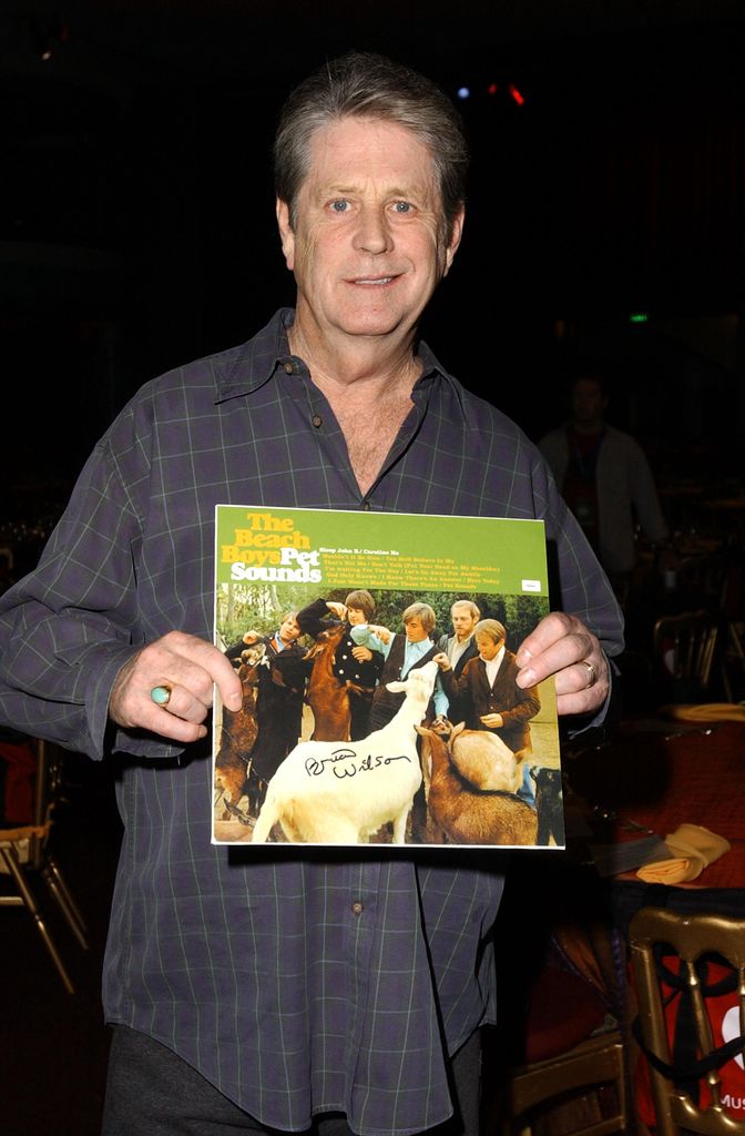 Brian Wilson, 2005 MusiCares Person of the Year, with an autographed copy of the 1966 Beach Boys album "Pet Sounds" 