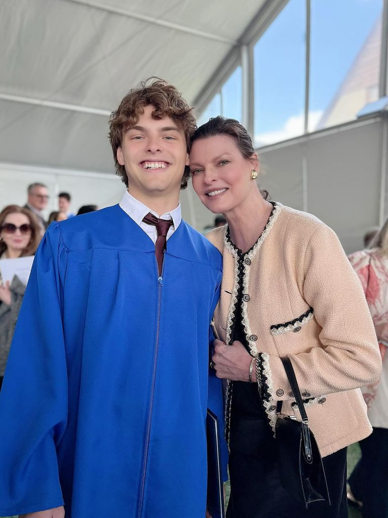 Linda evangelista with son in blue graduation gown