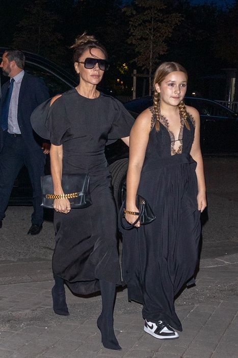 Victoria Beckham and Harper Beckham wear matching black dresses