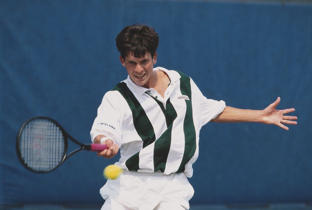 Tim henman playing tennis in 90s