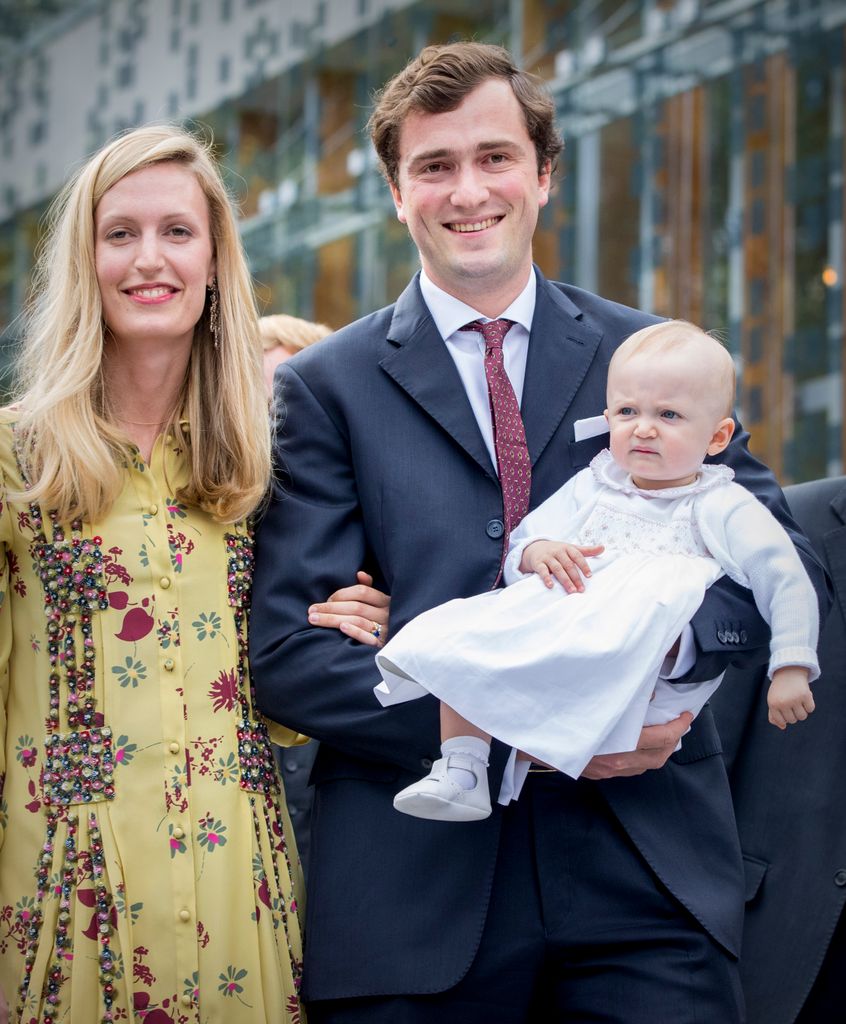 Prince Amedeo and wife Lili holding a baby