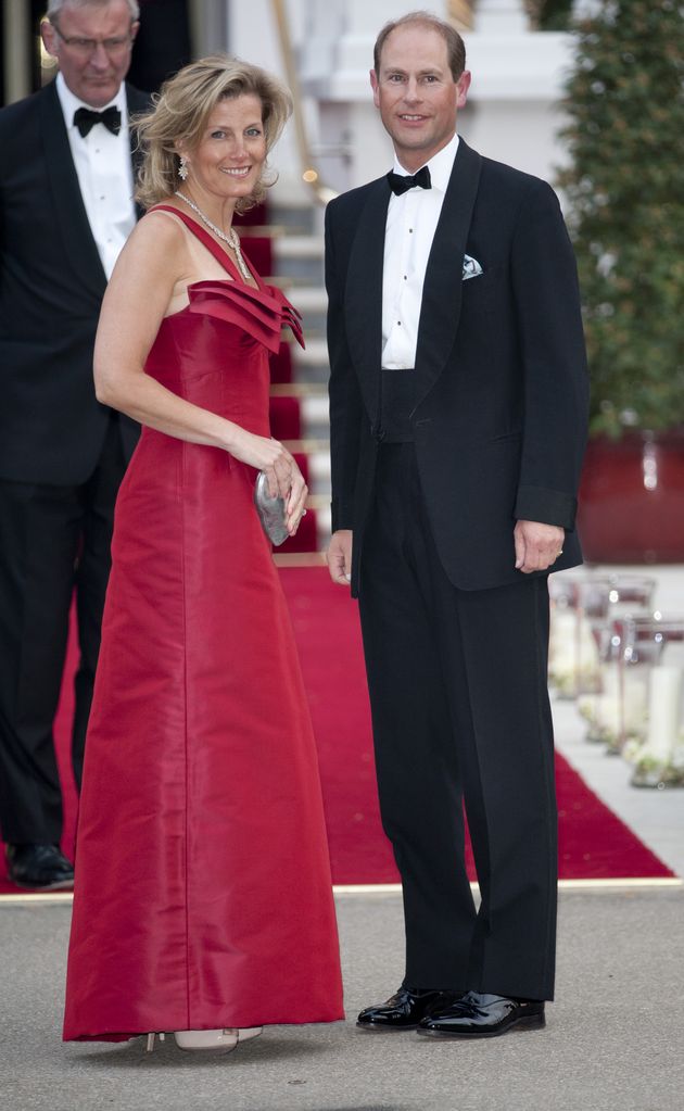Duchess Sophie in red dress with edward in black tie