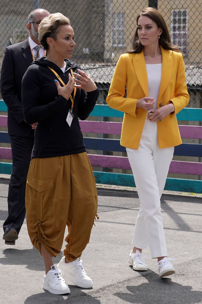 Catherine, Princess of Wales (R) speaks to Dame Kelly Holmes as she visits the Dame Kelly Holmes Trust on May 16, 2023 in Bath, England.