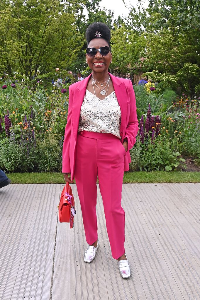 floella benjamin in hot pink suit